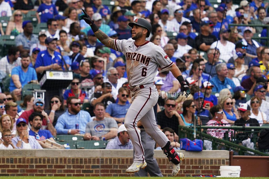 Nam Y. Huh Arizona Diamondbacks' David Peralta celebrates his solo home run during the third inning of a baseball game against the Chicago Cubs in Chicago, Friday, May 20, 2022. (AP Photo/Nam Y. Huh)