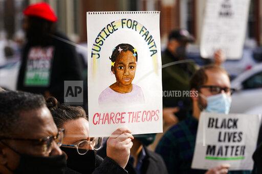 Protesters demonstrate calling for police accountability in the death of 8-year-old Fanta Bility who was shot outside a football game, at the Delaware County Courthouse in Media, Pa., Thursday, Jan. 13, 2022. Authorities say officers were responding to gunfire between two teens when Bility was fatally struck by a police bullet in 2021. (AP Photo/Matt Rourke)