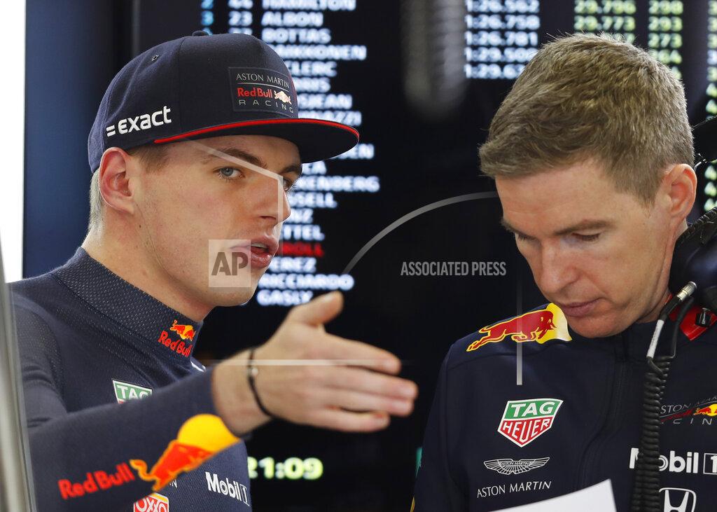 Red Bull driver Max Verstappen, of the Netherlands, talks to a member of his team during the final practice session for the Formula One Mexico Grand Prix auto race at the Hermanos Rodriguez racetrack in Mexico City, Saturday, Oct. 26, 2019. (AP Photo/Eduardo Verdugo)