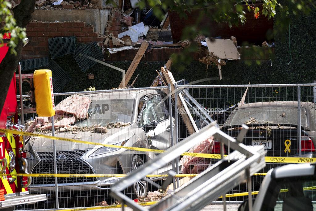 Ben Gray Damaged cars sit in front of an apartment building Monday Sept. 13, 2021 in Dunwoody, Ga., just outside of Atlanta, following an explosion Sunday. (AP Photo/Ben Gray)