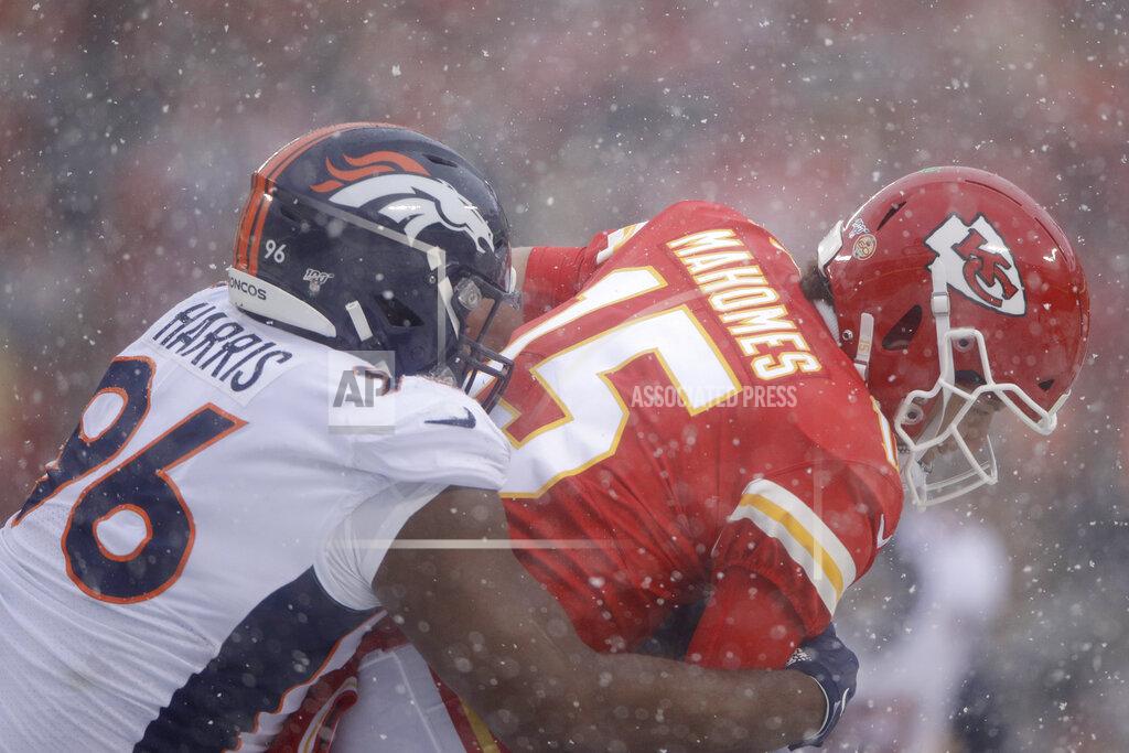 Charlie Riedel Denver Broncos nose tackle Shelby Harris (96) sacks Kansas City Chiefs quarterback Patrick Mahomes (15) during the first half of an NFL football game in Kansas City, Mo., Sunday, Dec. 15, 2019. (AP Photo/Charlie Riedel)