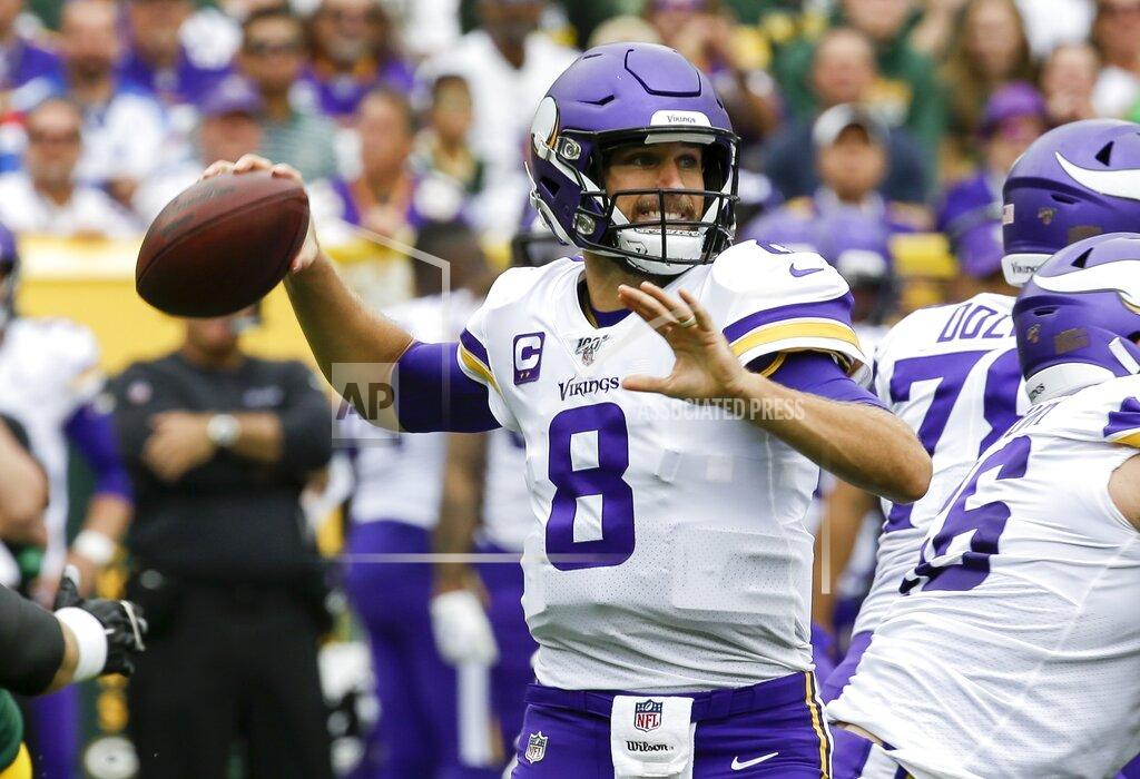 Mike Roemer Minnesota Vikings' Kirk Cousins throws during the first half of an NFL football game against the Green Bay Packers Sunday, Sept. 15, 2019, in Green Bay, Wis. (AP Photo/Mike Roemer)