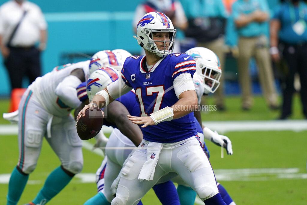 Lynne Sladky Buffalo Bills quarterback Josh Allen (17) looks to pass, during the second half of an NFL football game against the Miami Dolphins, Sunday, Sept. 20, 2020, in Miami Gardens, Fla. (AP Photo/Lynne Sladky)