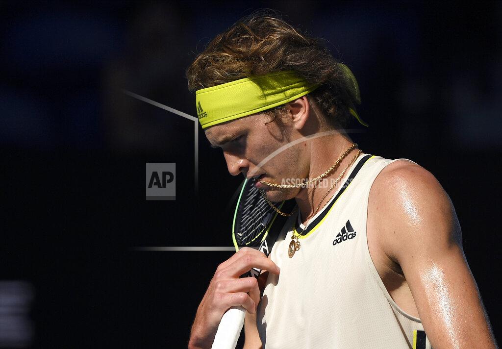 Andy Brownbill Germany's Alexander Zverev reacts during his third round match against France's Adrian Mannarino at the Australian Open tennis championship in Melbourne, Australia, Friday, Feb. 12, 2021.(AP Photo/Andy Brownbill)