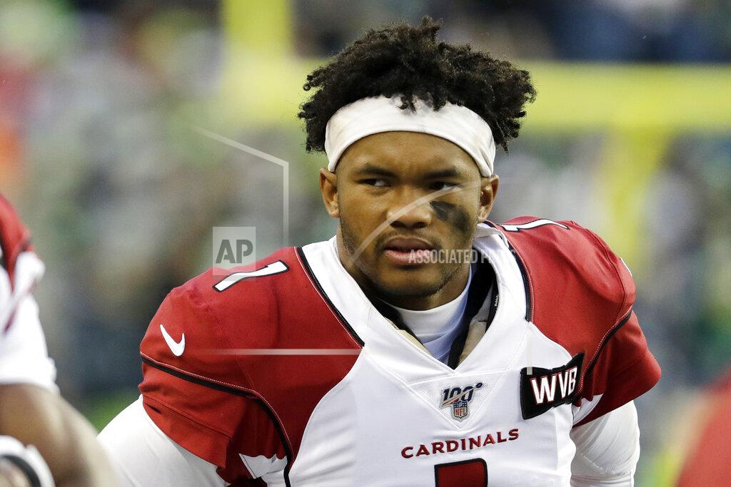 Lindsey Wasson FILE - In this Dec. 22, 2019, file photo, Arizona Cardinals quarterback Kyler Murray watches from the sideline after getting injured in the in the second half of an NFL football game against the Seattle Seahawks in Seattle. Murray says he’ll be kneeling for the national anthem this season. The Cardinals’ emerging star wasn’t particularly vocal about social issues during his first season but said that would change in the aftermath of the killing of George Floyd, a black man, while in police custody in Minneapolis (AP Photo/Lindsey Wasson, File)