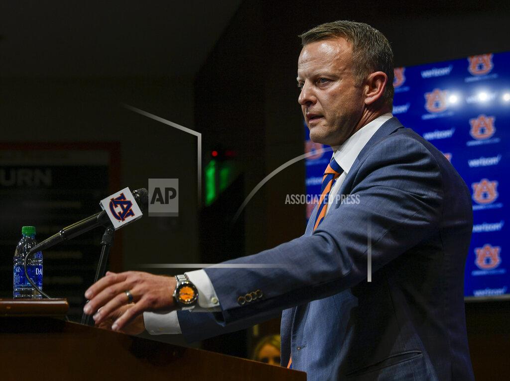 Todd Van Emst In this photo provided by Auburn Athletics, Bryan Harsin, Auburn's new college football coach, talks during a news conference Thursday, Dec. 24, 2020, in Auburn, Ala. (Todd Van Emst/Auburn Athletics via AP)