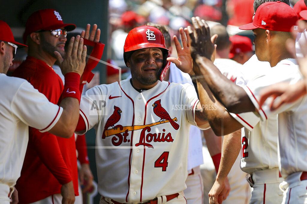 Scott Kane St. Louis Cardinals' Yadier Molina is congratulated by teammates after scoring a run during the second inning of a baseball game against the San Francisco Giants, Saturday, May 14, 2022, in St. Louis. (AP Photo/Scott Kane)
