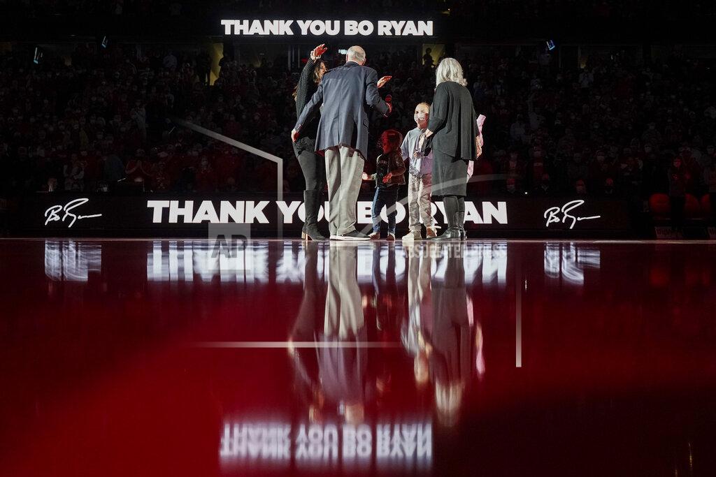 Andy Manis Bo Ryan, a former Wisconsin basketball coach, is greeted by his family during a ceremony to celebrate his 15 seasons as coach, at halftime of the team's NCAA college basketball against Wisconsin-Green Bay on Friday, Nov. 12, 2021, in Madison, Wis. Ryan led Wisconsin to a school-record of 364 wins in 15 seasons. (AP Photo/Andy Manis)