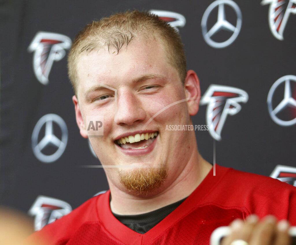 FILE - In this May 10, 2019, file photo, Atlanta Falcons offensive lineman Kaleb McGary speaks to the media after NFL football rookie camp in Flowery Branch, Ga. The Falcons' offensive line remains a work in progress. Having rookie first-round pick Kaleb McGary again cleared for contact following a heart procedure may help. (AP Photo/Tami Chappell, File)
