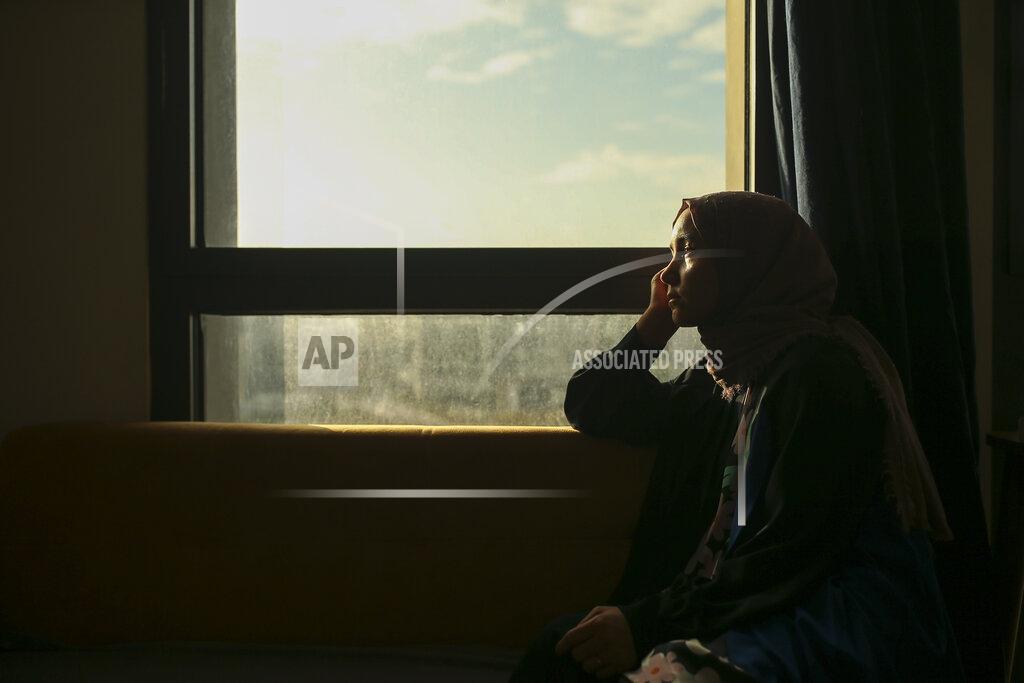 Emrah Gurel Uyghur Nursimangul Abdureshid, 34, poses for a photograph during an interview with The Associated Press in Istanbul, Turkey on May 4, 2022. Nearly one in 25 people in a county in the Uyghur heartland of China has been sentenced to prison on terrorism-related charges, in what is the highest known imprisonment rate in the world, an Associated Press review of leaked data shows. Abdureshid's brother, Memetali Abdureshid, who ran a car repair shop, was listed as being sentenced to 15 years and 11 months in prison on charges of "picking quarrels and provoking trouble” and “preparing to carry out terrorist activities." (AP Photo/Emrah Gurel)