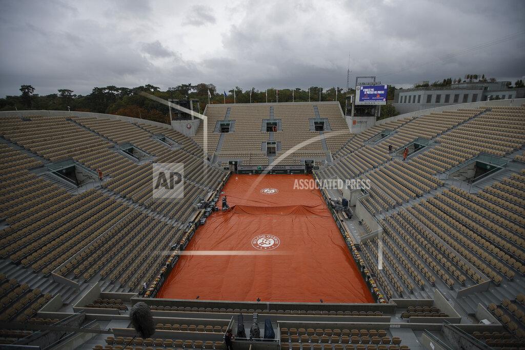 Alessandra Tarantino View of Suzanne Lenglen court with rain clouds overhead after most third round matches of the French Open tennis tournament were suspended at the Roland Garros stadium in Paris, France, Friday, Oct. 2, 2020. (AP Photo/Alessandra Tarantino)