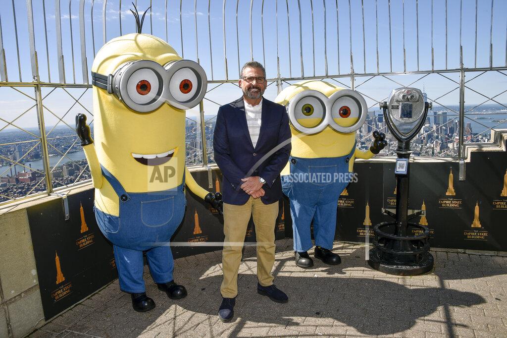 Evan Agostini Actor Steve Carell and two Minion characters pose on the 86th floor observatory deck at the Empire State Building to celebrate the upcoming film "Minions: The Rise of Gru" on Tuesday, June 28, 2022, in New York. (Photo by Evan Agostini/Invision/AP)