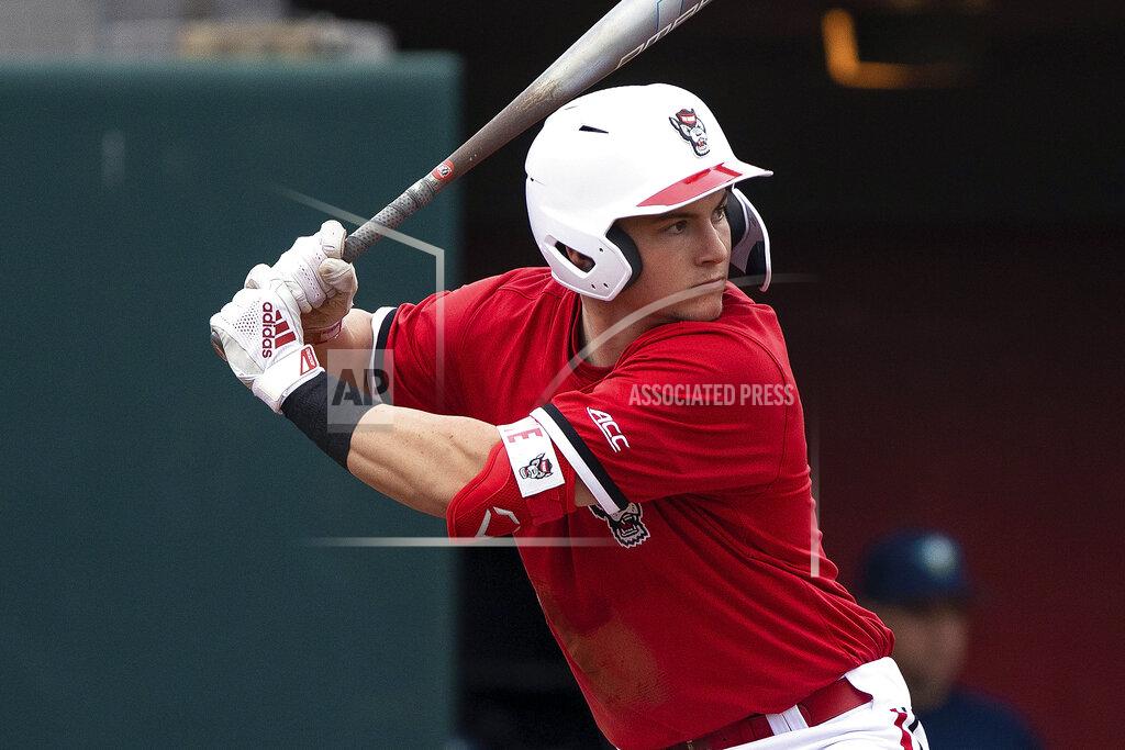 Ben Mckeown FILE - In this Feb. 25, 2020, file photo, North Carolina State's Patrick Bailey (5) bats during an NCAA baseball game on in Raleigh, N.C. Bailey is expected to be an early selection in the Major League Baseball draft. (AP Photo/Ben McKeown, File)