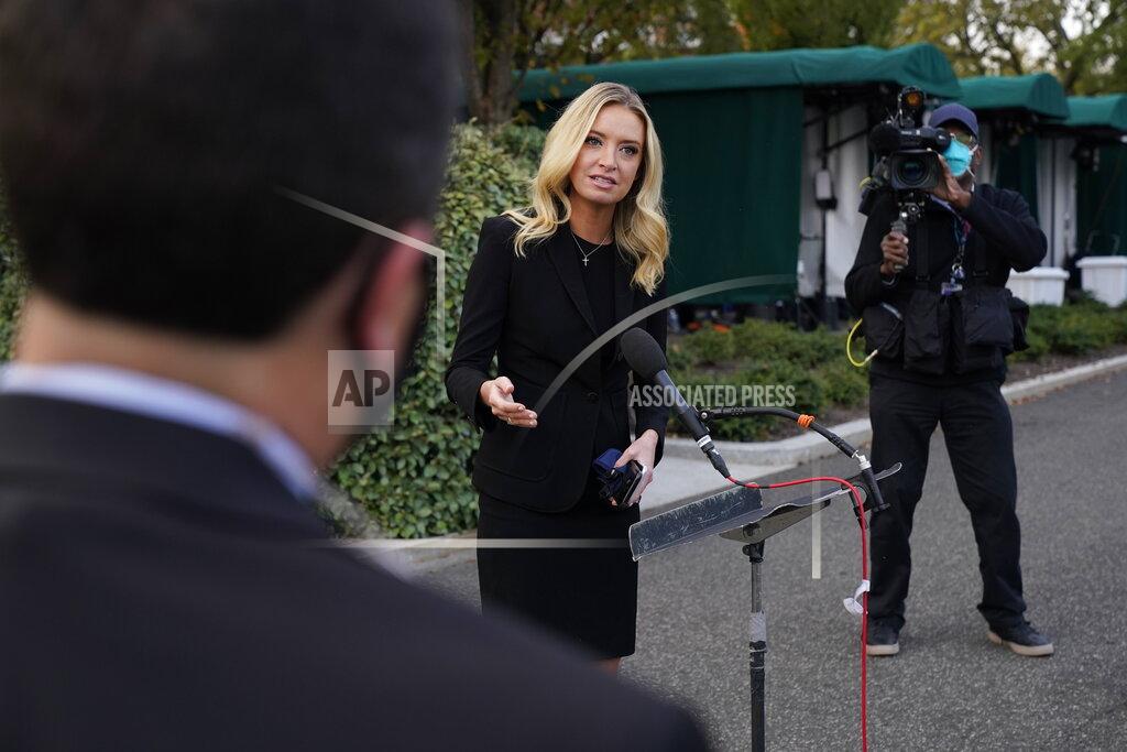 Jacquelyn Martin White House press secretary Kayleigh McEnany, talks to the media, Sunday, Oct. 4, 2020, outside the White House in Washington. (AP Photo/Jacquelyn Martin))