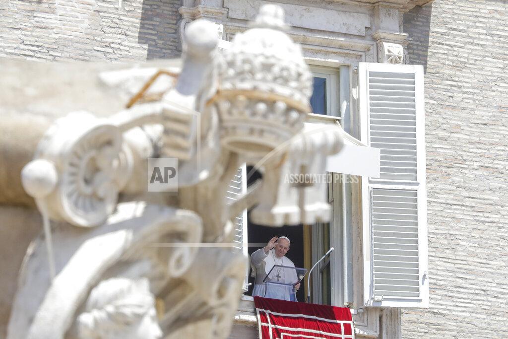 Andrew Medichini Pope Francis delivers his blessing as he recites the Angelus noon prayer from the window of his studio overlooking St.Peter's Square, at the Vatican, Sunday, June 7, 2020. Pope Francis is cautioning people in countries emerging from lockdown to keep following authorities’ rules for COVID-19 contagion containment. Says Francis: “Be careful, don’t cry victory, don’t cry victory too soon.” (AP Photo/Andrew Medichini)