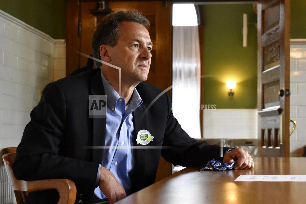 Matthew Brown FILE - In this July 24, 2020, file photo, then-Montana Gov. Steve Bullock speaks to members of the business community in Billings, Mont. Republican lawmakers in Montana are pushing a series of bills that would limit abortion access and remove gun restrictions, hoping to capitalize on GOP control following the November election. Montana has a Republican governor for the first time in 16 years, opening the door to pass into law bills previously vetoed by Democratic governors. (AP Photo/Matthew Brown, File)