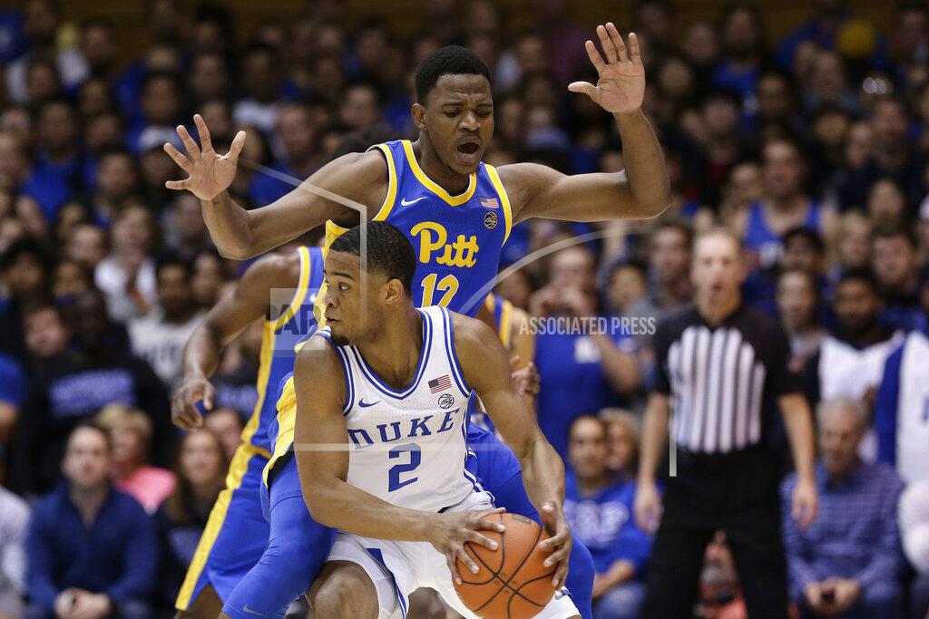 Gerry Broome Pittsburgh forward Abdoul Karim Coulibaly (12) guards Duke guard Cassius Stanley (2) during the first half of an NCAA college basketball game in Durham, N.C., Tuesday, Jan. 28, 2020. (AP Photo/Gerry Broome)
