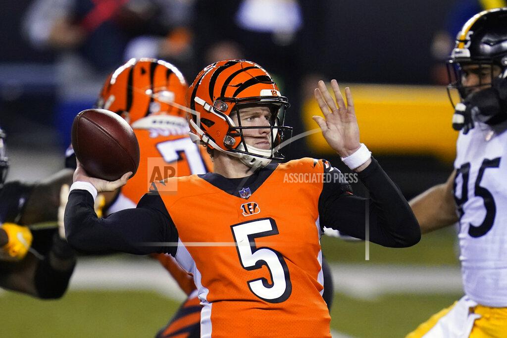 Michael Conroy Cincinnati Bengals quarterback Ryan Finley (5) throws during the first half of an NFL football game against the Pittsburgh Steelers, Monday, Dec. 21, 2020, in Cincinnati. (AP Photo/Michael Conroy)