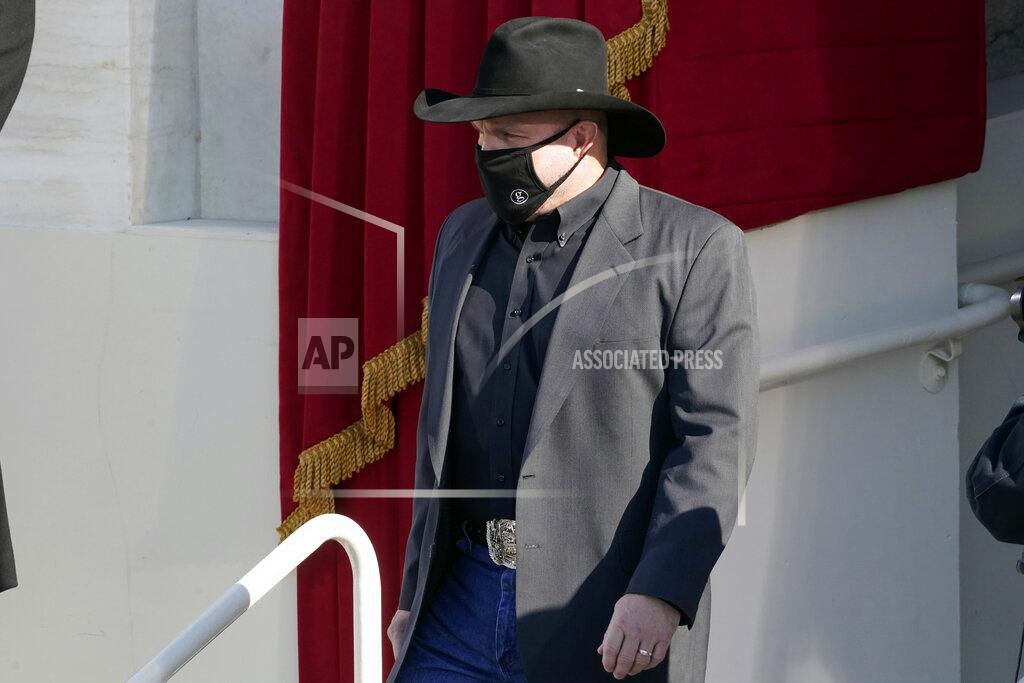 Andrew Harnik Garth Brooks arrives to sing 'Amazing Grace' as President Joe Biden listens during the 59th Presidential Inauguration at the U.S. Capitol in Washington, Wednesday, Jan. 20, 2021. (AP Photo/Andrew Harnik)