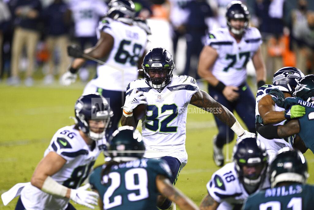 Derik Hamilton Seattle Seahawks' Chris Carson rushes during the first half of an NFL football game against the Philadelphia Eagles, Monday, Nov. 30, 2020, in Philadelphia. (AP Photo/Derik Hamilton)