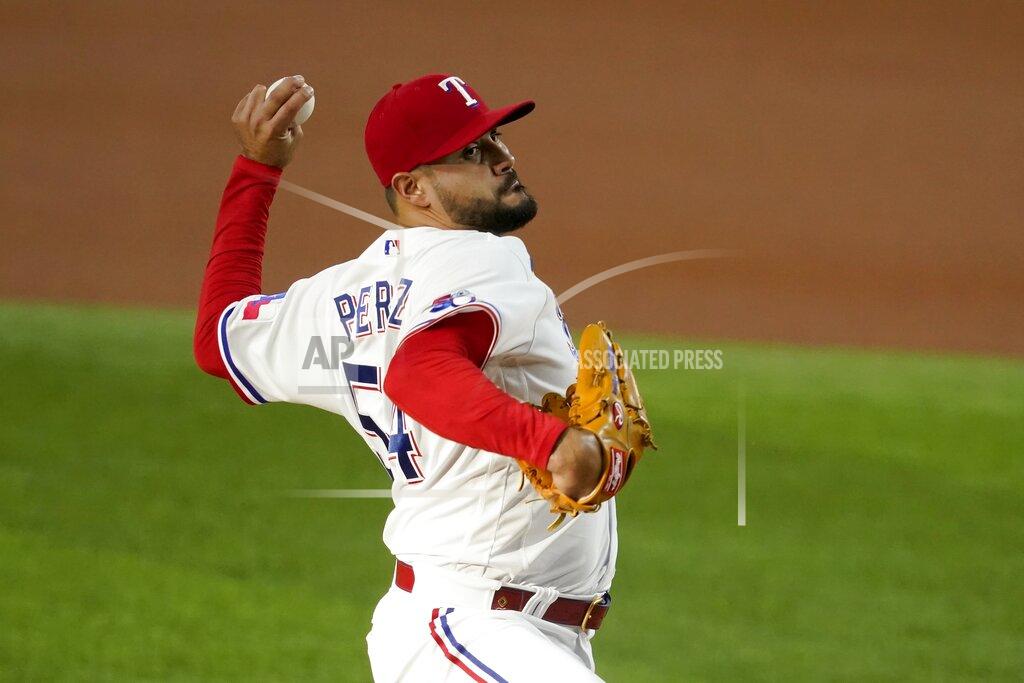 Tony Gutierrez Texas Rangers starting pitcher Martin Perez throws to the Kansas City Royals in the first inning of a baseball game, Tuesday, May 10, 2022, in Arlington,Texas. (AP Photo/Tony Gutierrez)