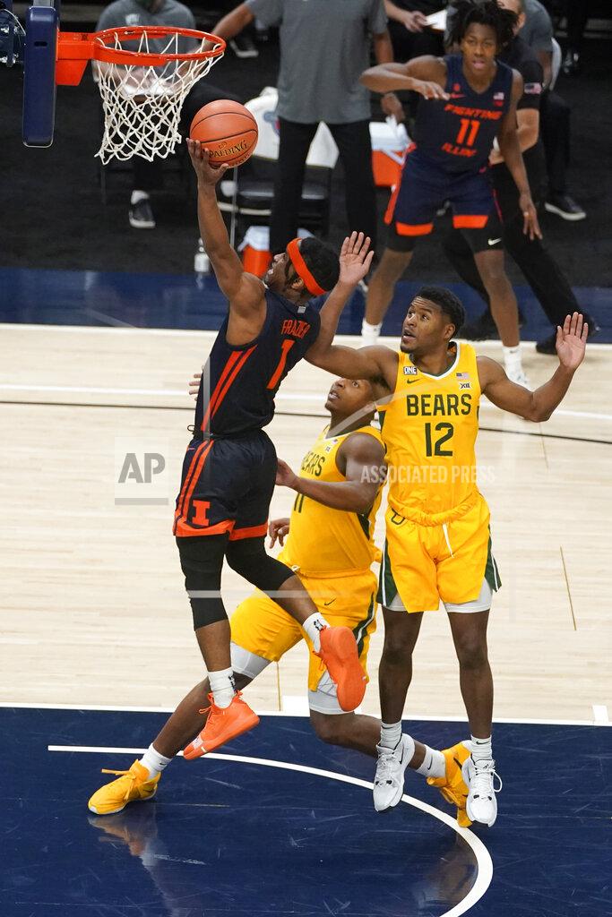 Darron Cummings Illinois' Trent Frazier (1) puts up a shot against Baylor's Jared Butler (12) and Mark Vital (11) during the first half of an NCAA college basketball game, Wednesday, Dec. 2, 2020, in Indianapolis. (AP Photo/Darron Cummings)