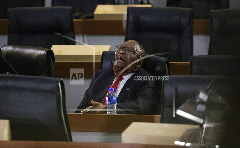 Themba Hadebe Former South African President Jacob Zuma, laughs as he waits for the state capture hearings to get underway in Johannesburg, Tuesday, Nov. 17, 2020. Zuma is appearing before a state commission investigating serious allegations of corruption during his tenure as head of state between 2009 and 2018. (AP Photo/Themba Hadebe)