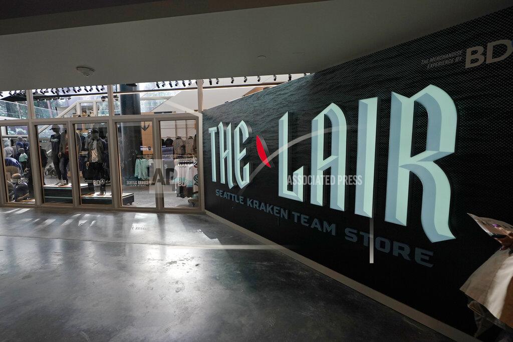 Ted S. Warren The Lair, the Seattle Kraken team store inside Climate Pledge Arena, is shown Wednesday, Oct. 20, 2021, during a media tour ahead of the NHL hockey team's home opener Saturday against the Vancouver Canucks in Seattle. The historic angled roof of the former KeyArena was preserved, but everything else inside the venue, which will also host concerts and be the home of the WNBA Seattle Storm basketball team, is brand new. (AP Photo/Ted S. Warren)