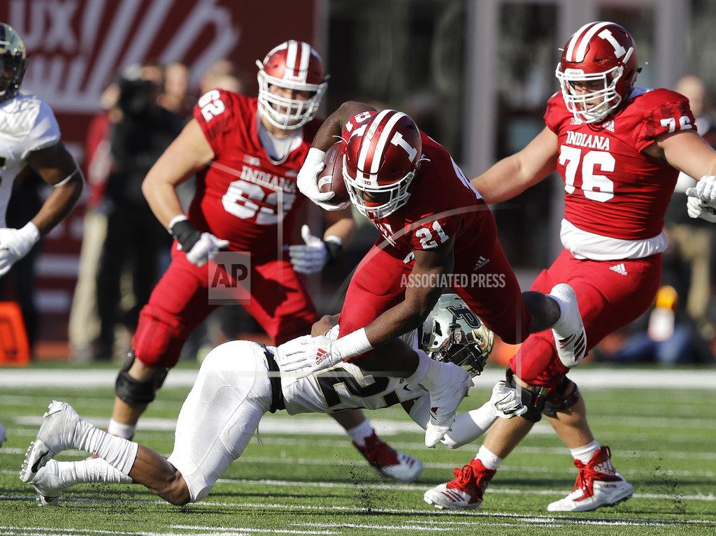 Darron Cummings Indiana's Stevie Scott (21) is tackled by Purdue's Navon Mosley during the second half of an NCAA college football game, Saturday, Nov. 24, 2018, in Bloomington, Ind. Purdue won 28-21. (AP Photo/Darron Cummings)