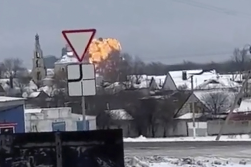 CAPTION CORRECTS MONTH In this handout photo taken from validated UGC video show flames rising from the scene of a warplane crashed at a residential area near Yablonovo, Belgorod region, Wednesday, Jan. 23, 2024. Russia says a military transport plane that was carrying 65 Ukrainian prisoners of war has crashed in a Russian region near Ukraine. (Validated UGC video via AP)