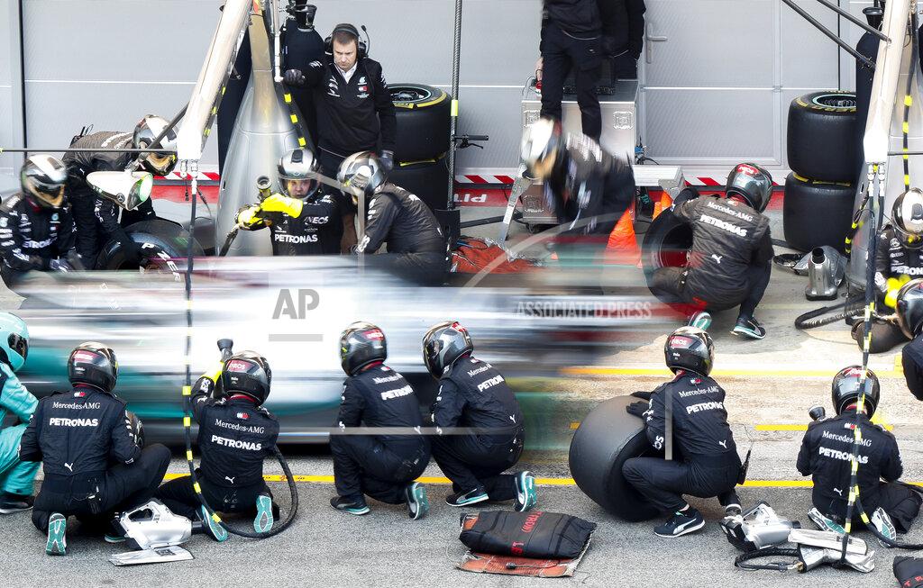 Joan Monfort Mercedes-AMG Petronas' Lewis Hamilton makes a pit stop during a Formula One pre-season testing session at the Barcelona Catalunya racetrack in Montmelo, outside Barcelona, Spain, Wednesday, Feb. 19, 2020. (AP Photo/Joan Monfort)