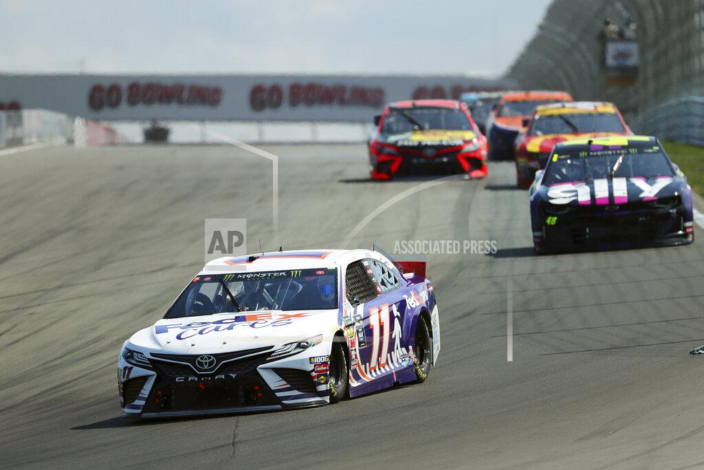 John Munson Denny Hamlin heads into Turn 1 during a NASCAR Cup Series auto race at Watkins Glen International, Sunday, Aug. 4, 2019, in Watkins Glen, N.Y. (AP Photo/John Munson)