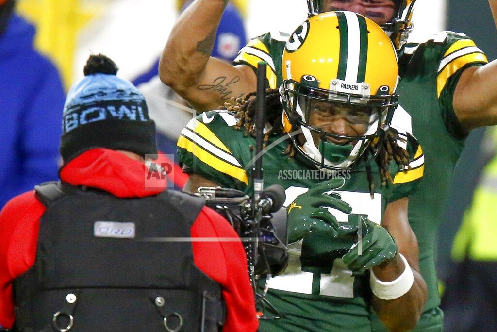 Matt Ludtke Green Bay Packers' Davante Adams reacts after catching a touchdown pass during the first half of an NFL football game against the Chicago Bears Sunday, Nov. 29, 2020, in Green Bay, Wis. (AP Photo/Matt Ludtke)