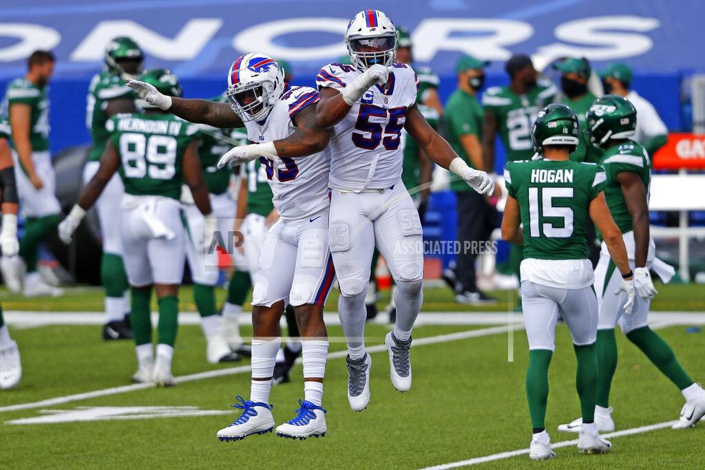 Jeffrey T. Barnes Buffalo Bills defensive end Jerry Hughes (55) celebrates his fumble recovery with defensive end Quinton Jefferson during the second half of an NFL football game against the New York Jets in Orchard Park, N.Y., Sunday, Sept. 13, 2020. (AP Photo/Jeffrey T. Barnes)