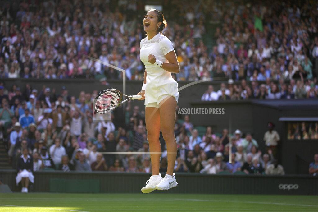 Kirsty Wigglesworth Britain's Emma Raducanu celebrates beating Belgium's Alison van Uytvanck to win a women's first round singles match on day one of the Wimbledon tennis championships in London, Monday, June 27, 2022. (AP Photo/Kirsty Wigglesworth)