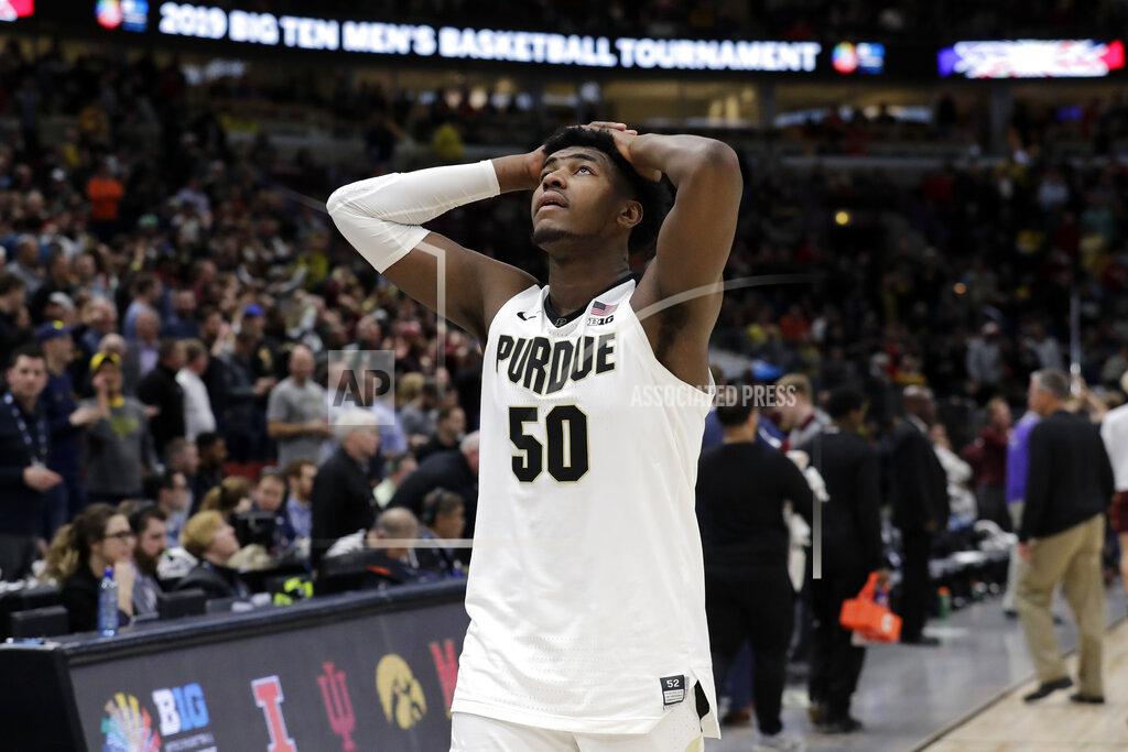 Nam Y. Huh Purdue's Trevion Williams (50) reacts as he walks off the court after an NCAA college basketball game against the Minnesota in the quarterfinals of the Big Ten Conference tournament, Friday, March 15, 2019, in Chicago. Minnesota won 75-73. (AP Photo/Nam Y. Huh)
