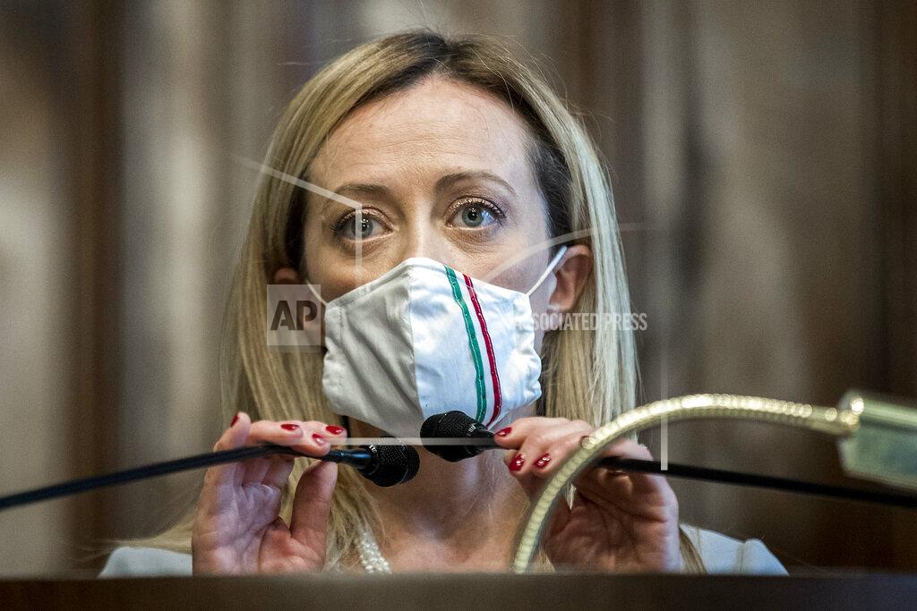 Roberto Monaldo Leader of Brothers of Italy party, Giorgia Meloni, speaks to the media after meeting Mario Draghi, at the Chamber of Deputies in Rome, Tuesday, Feb.9, 2021. Former European Central Bank chief Draghi is consulting Italy's fractious parties after being tapped by President Sergio Mattarella to try to pull together a government to guide the debt-riddled country through the health and economic crises it is confronting. (Roberto Monaldo/LaPresse via AP)
