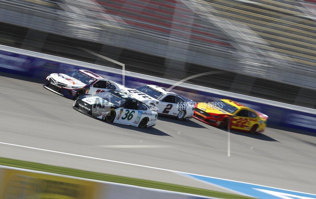 Carlos Osorio Matt Tifft (36), Denny Hamlin (11), Brad Keselowski (2), and Joey Logano (22) drive during a practice session for the NASCAR cup series race at Michigan International Speedway, Friday, June 7, 2019, in Brooklyn, Mich. (AP Photo/Carlos Osorio)