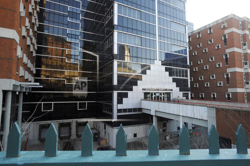 This Feb. 25, 2013 photo shows the Allegheny County Jail in Pittsburgh. Four inmates on Tuesday, Sept. 15, 2020 sued Allegheny County jail and mental health officials, alleging the in Pennsylvania facility offers inadequate treatment and medication for inmates with mental health disabilities and often punishes them with extended solitary confinement or excessive force. (Philip G. Pavely/Pittsburgh Tribune-Review via AP)