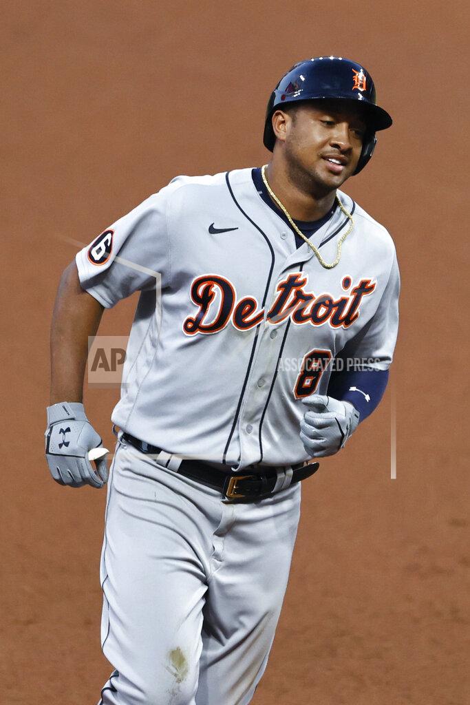 Ron Schwane Detroit Tigers' Jonathan Schoop rounds the bases after hitting a two-run home run off Cleveland Indians starting pitcher Adam Plutko during the fourth inning of a baseball game, Friday, Aug. 21, 2020, in Cleveland. (AP Photo/Ron Schwane)