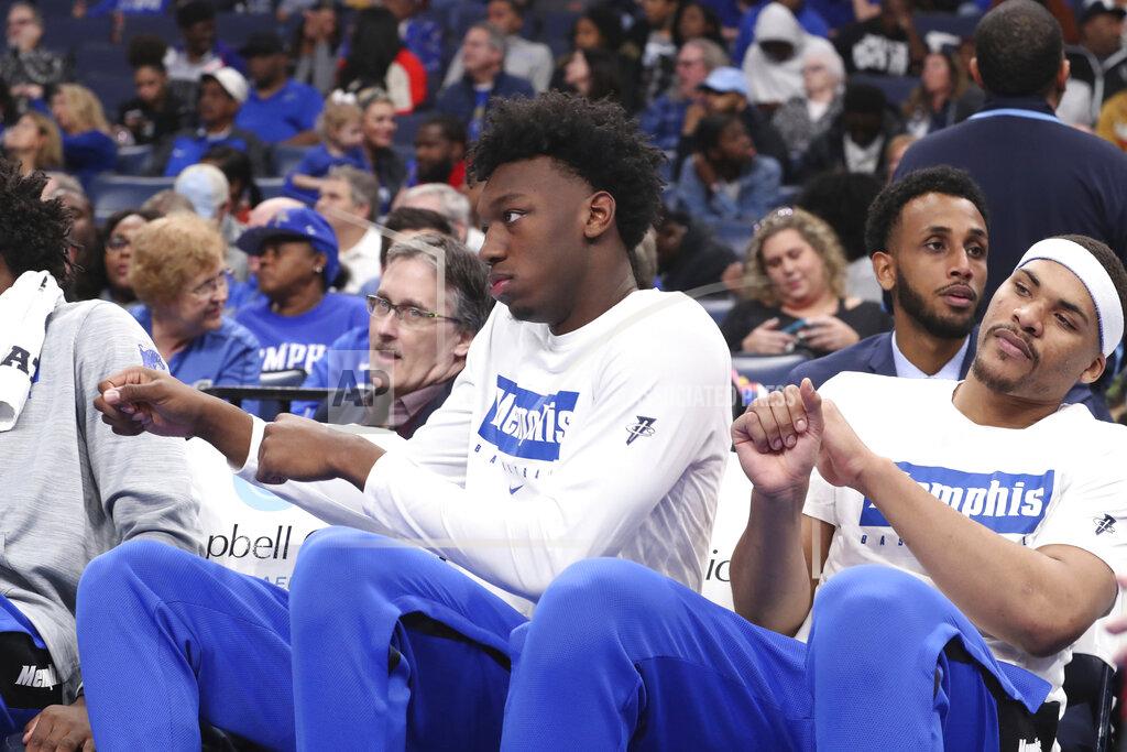 Karen Pulfer Focht Memphis' James Wiseman, second from right, sits out the game along with Isaiah Stokes, right, in an NCAA college basketball game against Alcorn State Saturday, Nov. 16, 2019, in Memphis, Tenn. Malcolm Dandridge is first from right. (AP Photo/Karen Pulfer Focht)