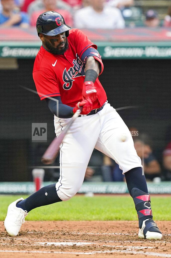 Tony Dejak Cleveland Indians' Franmil Reyes hits a three-run home run during the third inning of the team's baseball game against the Tampa Bay Rays, Thursday, July 22, 2021, in Cleveland. (AP Photo/Tony Dejak)