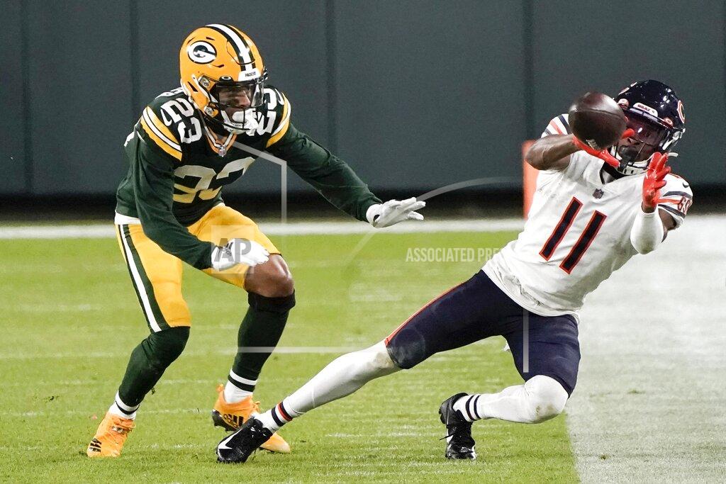 Morry Gash Chicago Bears' Darnell Mooney can't catch a pass in front of Green Bay Packers' Jaire Alexander during the second half of an NFL football game Sunday, Nov. 29, 2020, in Green Bay, Wis. The Packers won 41-25. (AP Photo/Morry Gash)