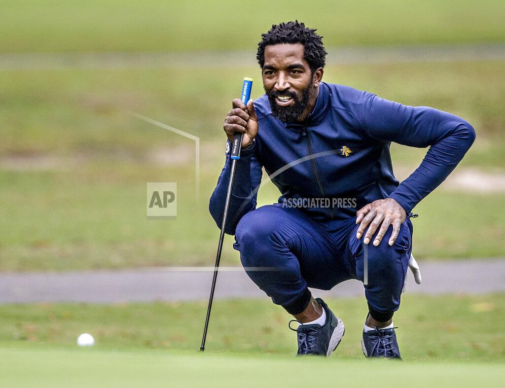 Woody Marshall North Carolina A&T's J.R. Smith lines up his shot to the 17th green during the second round of the Phoenix Invitational golf tournament in Burlington, N.C., Tuesday, Oct. 12, 2021. Smith spent 16 years playing in the NBA, winning two world championships. (Woody Marshall/News & Record via AP)