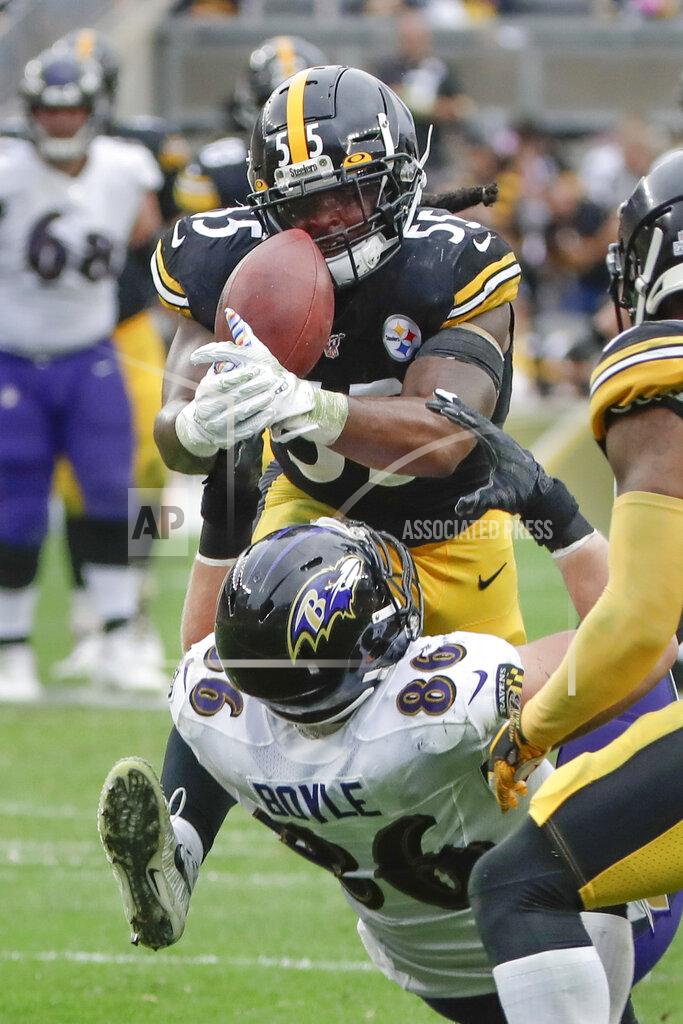 Gene Puskar Pittsburgh Steelers linebacker Devin Bush (55) intercepts a pass intended for Baltimore Ravens tight end Nick Boyle (86) during the second half of an NFL football game Sunday, Oct. 6, 2019, in Pittsburgh. (AP Photo/Gene Puskar)