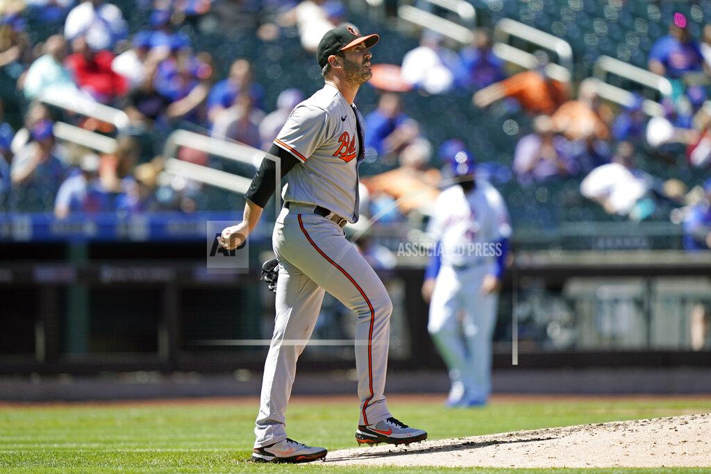 Kathy Willens Baltimore Orioles starting pitcher Matt Harvey reacts during the fifth inning of a baseball game against the New York Mets, Wednesday, May 12, 2021, in New York. Harvey allowed seven earned runs in four and a third innings. The Mets beat the Orioles 7-1. (AP Photo/Kathy Willens)