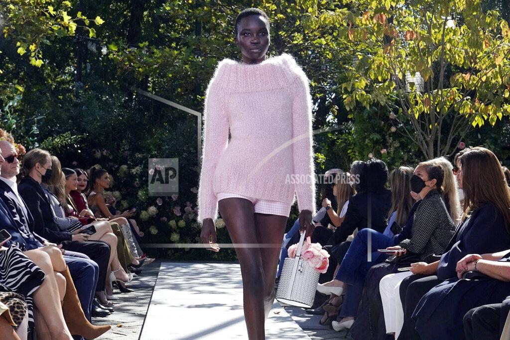 Richard Drew The Michael Kors Spring/Summer 2022 collection is modeled during Fashion Week, in New York, Friday, Sept. 10, 2021. (AP Photo/Richard Drew)