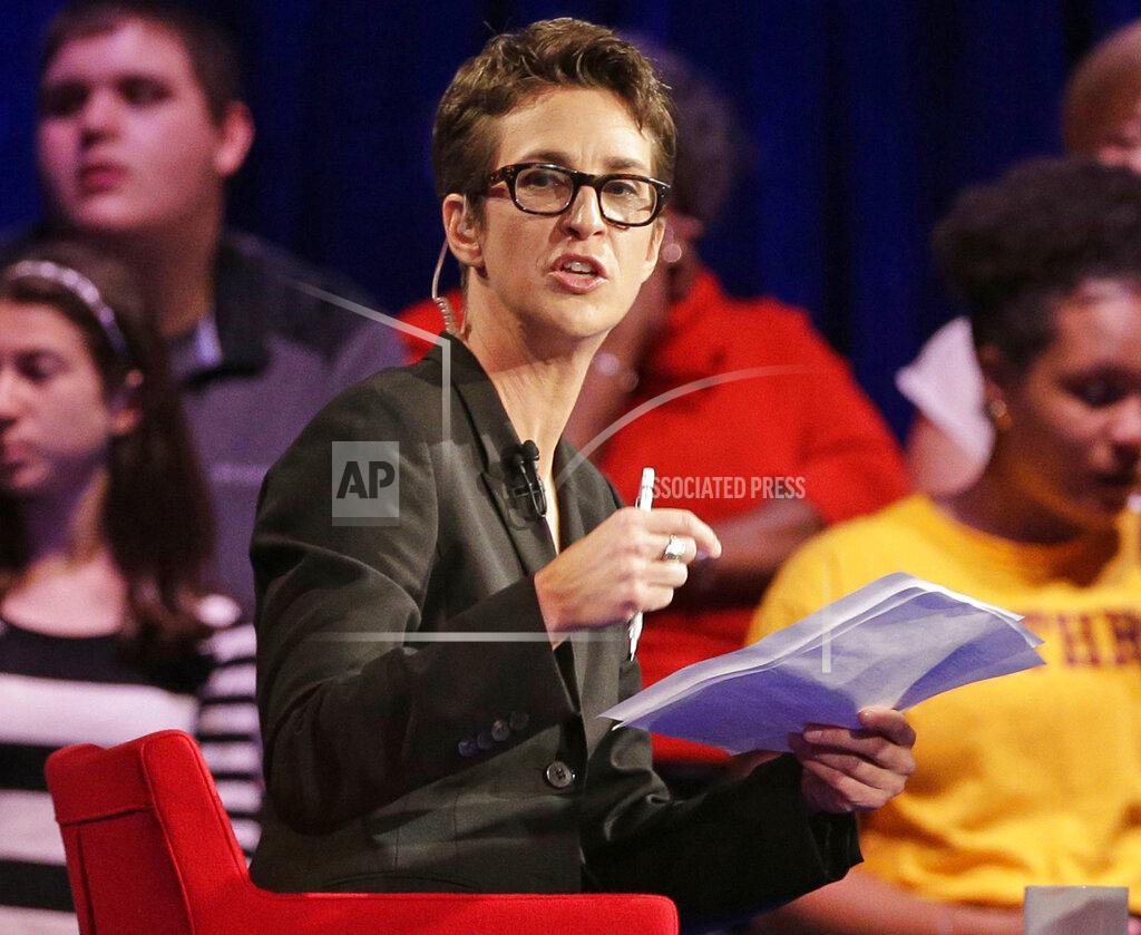 Chuck Burton FILE - In this Friday, Nov. 6, 2015, file photo, MSNBC's Rachel Maddow speaks during a Democratic presidential candidate forum at Winthrop University in Rock Hill, S.C. MSNBC mounted an aggressive on-air fact-checking operation during the Republican national convention, often breaking in to its telecast to question some of the claims made from the stage. Both Maddow and CNN's Daniel Dale aired “lightning-round” fact-checks following President Donald Trump's acceptance speech on Thursday night. The frequency of pre-taped speeches enabled MSNBC to call in experts to help with its fact-checking. (AP Photo/Chuck Burton, File)