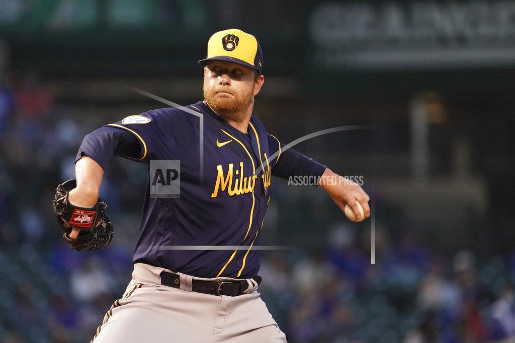David Banks Milwaukee Brewers starting pitcher Brett Anderson (25) throws the ball against the Chicago Cubs during the third inning of a baseball game, Monday, April, 5, 2021, in Chicago. (AP Photo/David Banks)