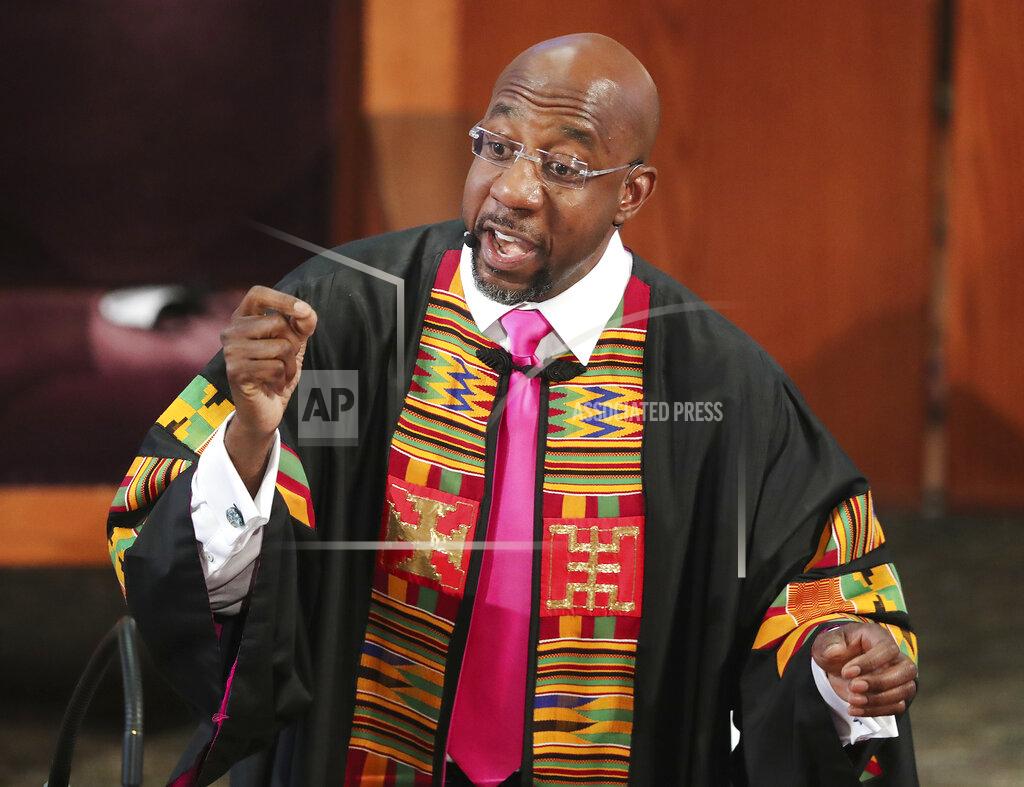 Curtis Compton FILE - In this June 23, 2020, file photo, Rev. Raphael G. Warnock delivers the eulogy for Rayshard Brooks' funeral at Ebenezer Baptist Church in Atlanta. Candidates in the special election for the U.S. Senate seat held by Georgia Republican Kelly Loeffler are set to square off in their first debate Monday, Oct. 19, 2020. Loeffler faces a large field including Democrat Warnock and fellow Republican Doug Collins in a race for the seat she was appointed to 10 months earlier. (Curtis Compton/Atlanta Journal-Constitution via AP, Pool, File)